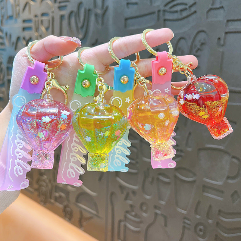 Wholesale Liquid Quicksand Bottles, Hot Air Balloons, Acrylic Keychains